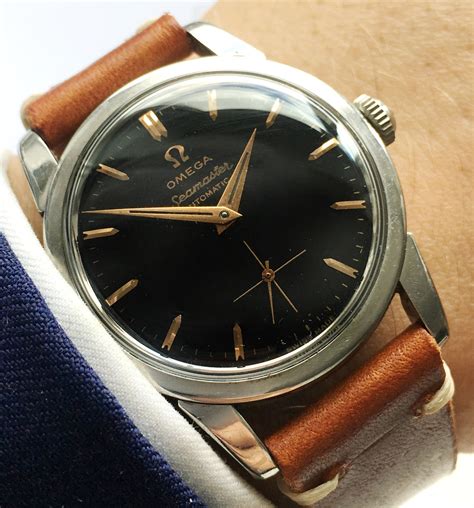 black omega seamaster|omega seamaster black dial vintage.